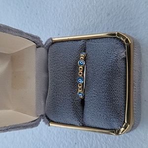 14 kt gold evil eye ring